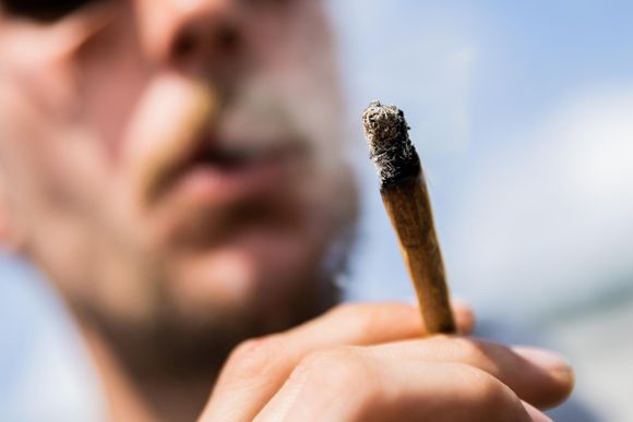 xbfj3o a man in berlin smokes a cannabis joint at a demonstration in march demanding that germany legalise the drug 20240220160002