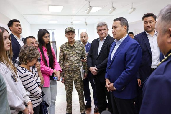 nt0w6m kazakhstan prime minister alikhan smailov met with family members of miners killed in the 17 august accident at a mine operated by arcelormittal. kazakhstan government. 20240610135030