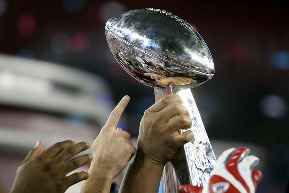 w34xif the new york giants hold the vince lombardi trophy after defeating the new england patriots 17 14 in super bowl xlii on 03 february 2008 at the university of phoenix stadium in glendale arizona 20240208163605