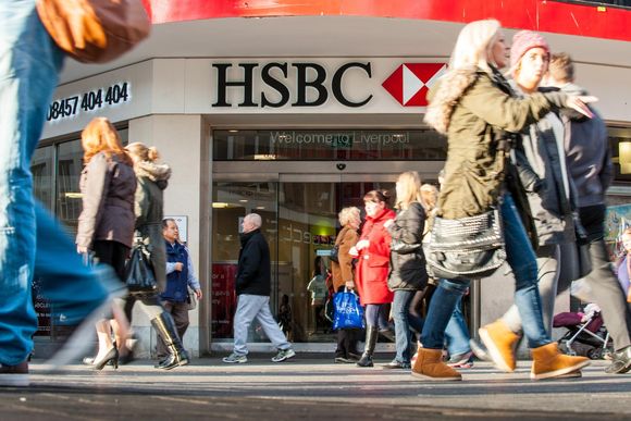 r3nt4h people walking past a hsbc bank branch in liverpool in the uk 20240430100830